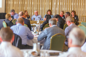 The speaker panel at the IRS Day seminar shared lunch and laughs with fellow members.